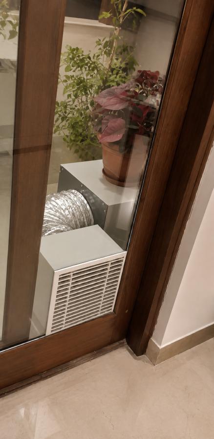 YOGa Air system mounted near a glass panel